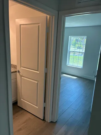 a view of small space with wooden floor