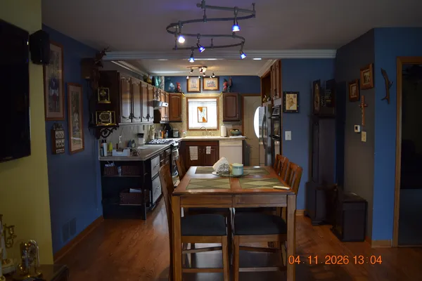 a view of a dining room with furniture