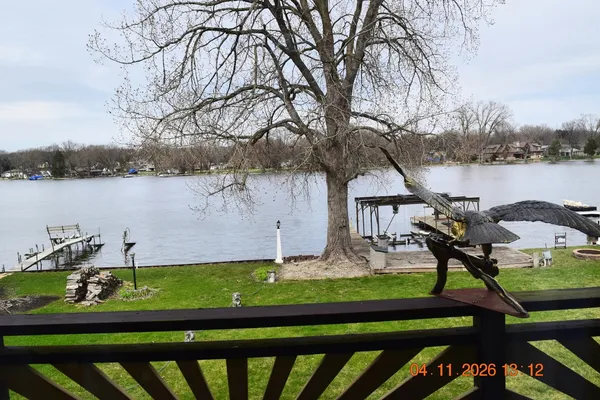 a view of a bench in front of house