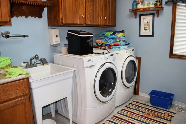 a utility room with dryer and washer