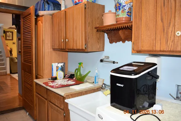 a kitchen with granite countertop a stove and a refrigerator