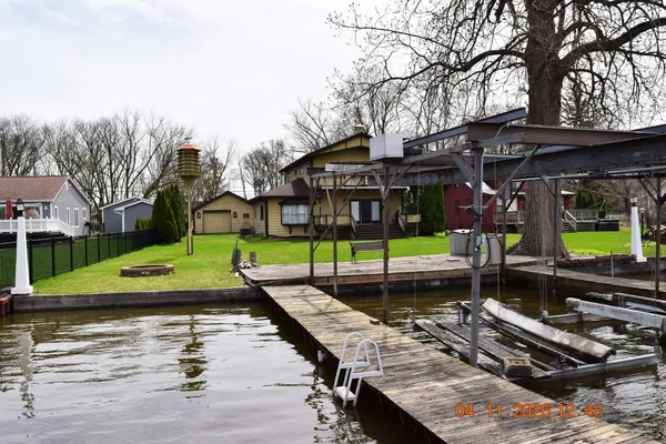 a view of a chairs and table in the patio