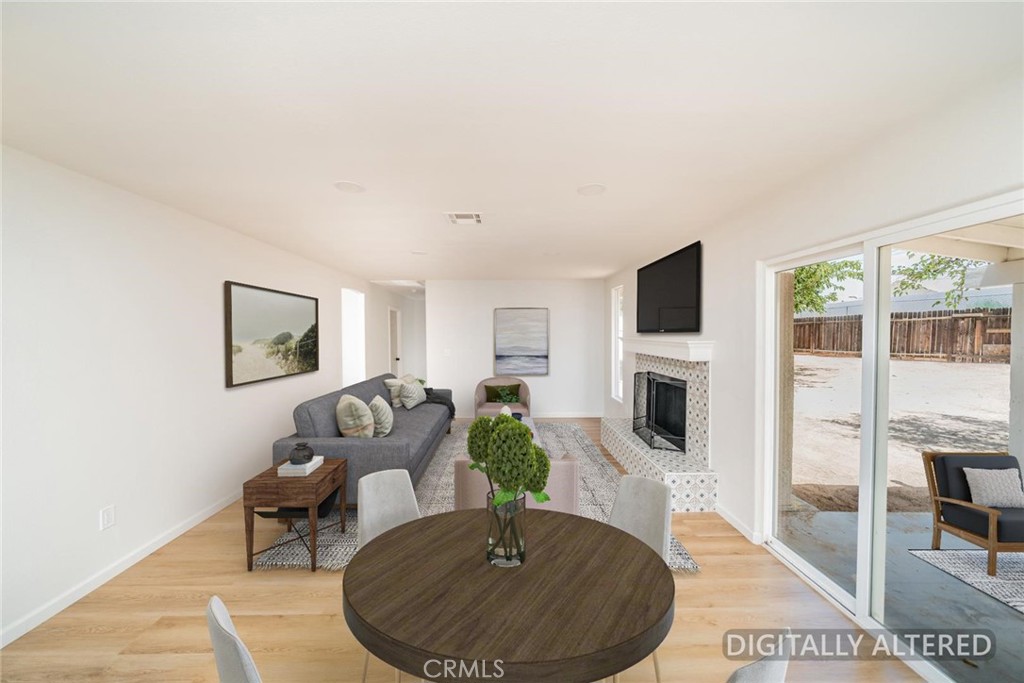 13913 Cronese Road Apple Valley, CA 92307 - Photo 9 of 29 Dining Area/Family Room (Disclaimer: Some images have been digitally enhanced with virtual staging to illustrate potential room layouts and furnishings. Actual property condition and features may vary. Buyer to verify all information independently).