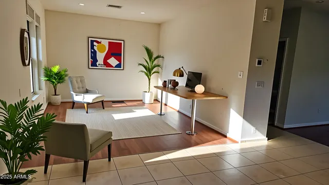 a view of a workspace with furniture