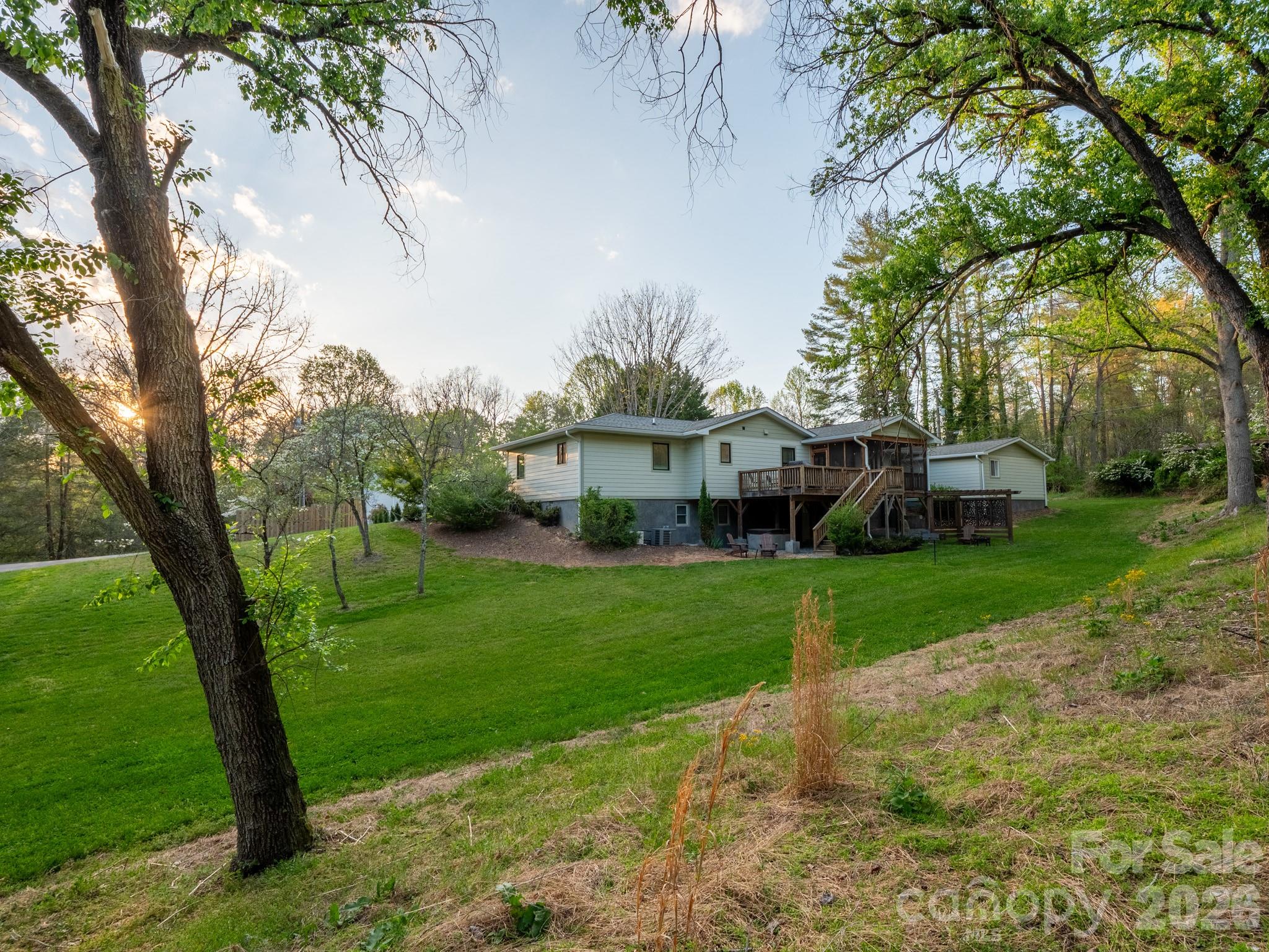 1048 Jenkins Valley Road Alexander, NC 28701 - Photo 24 of 25 a front view of a house with a garden