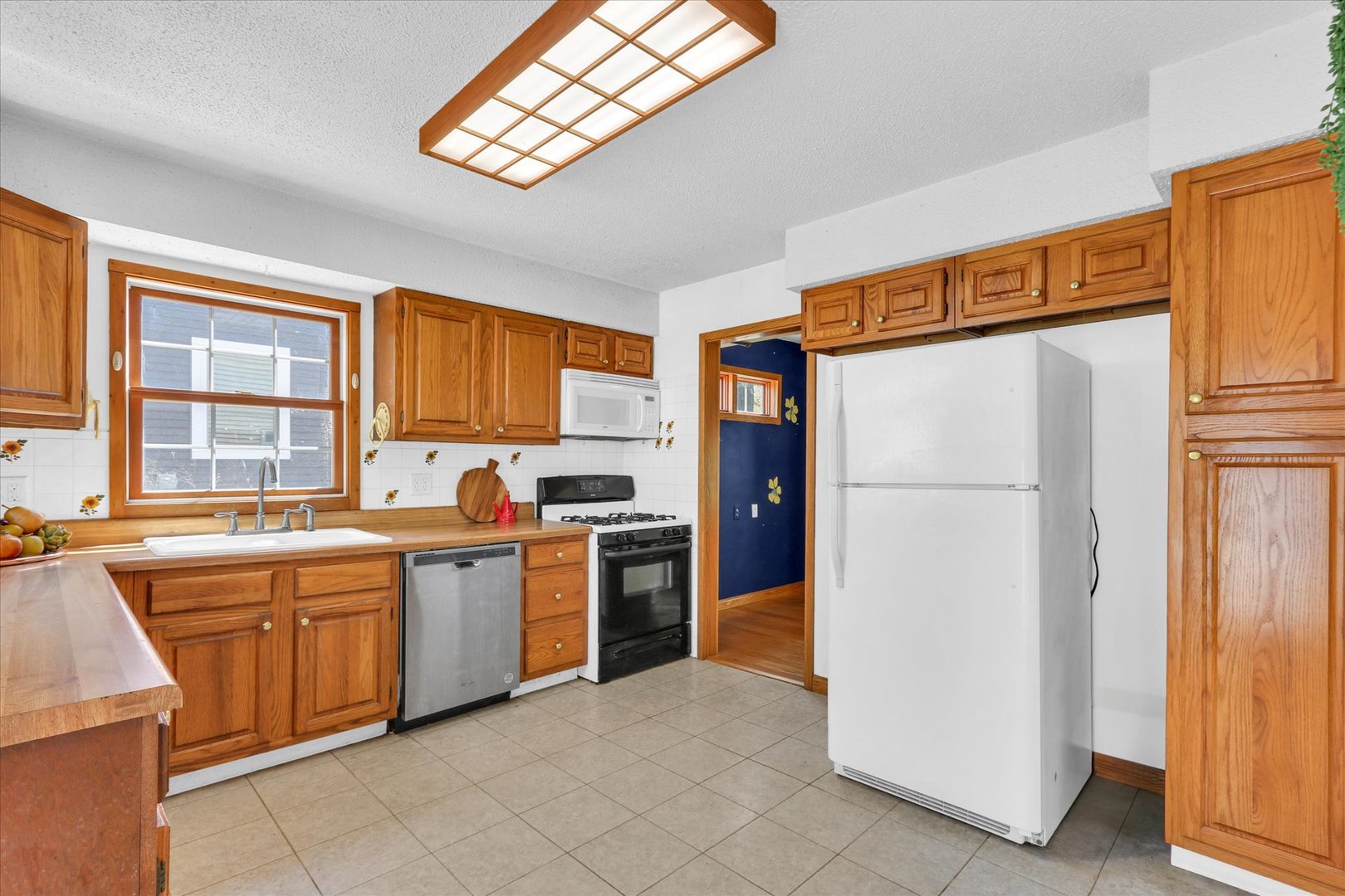 1108 Eastern Drive Urbana, IL 61801 - Photo 12 of 29 a kitchen with stainless steel appliances granite countertop a refrigerator and a sink