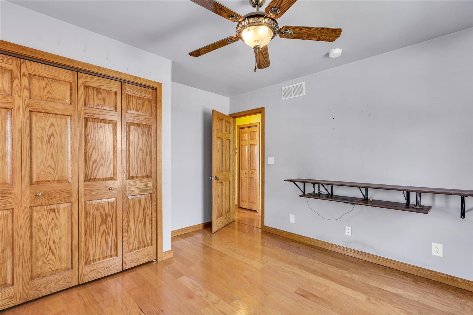 1108 Eastern Drive Urbana, IL 61801 - Photo 16 of 29 an empty room with windows and fan
