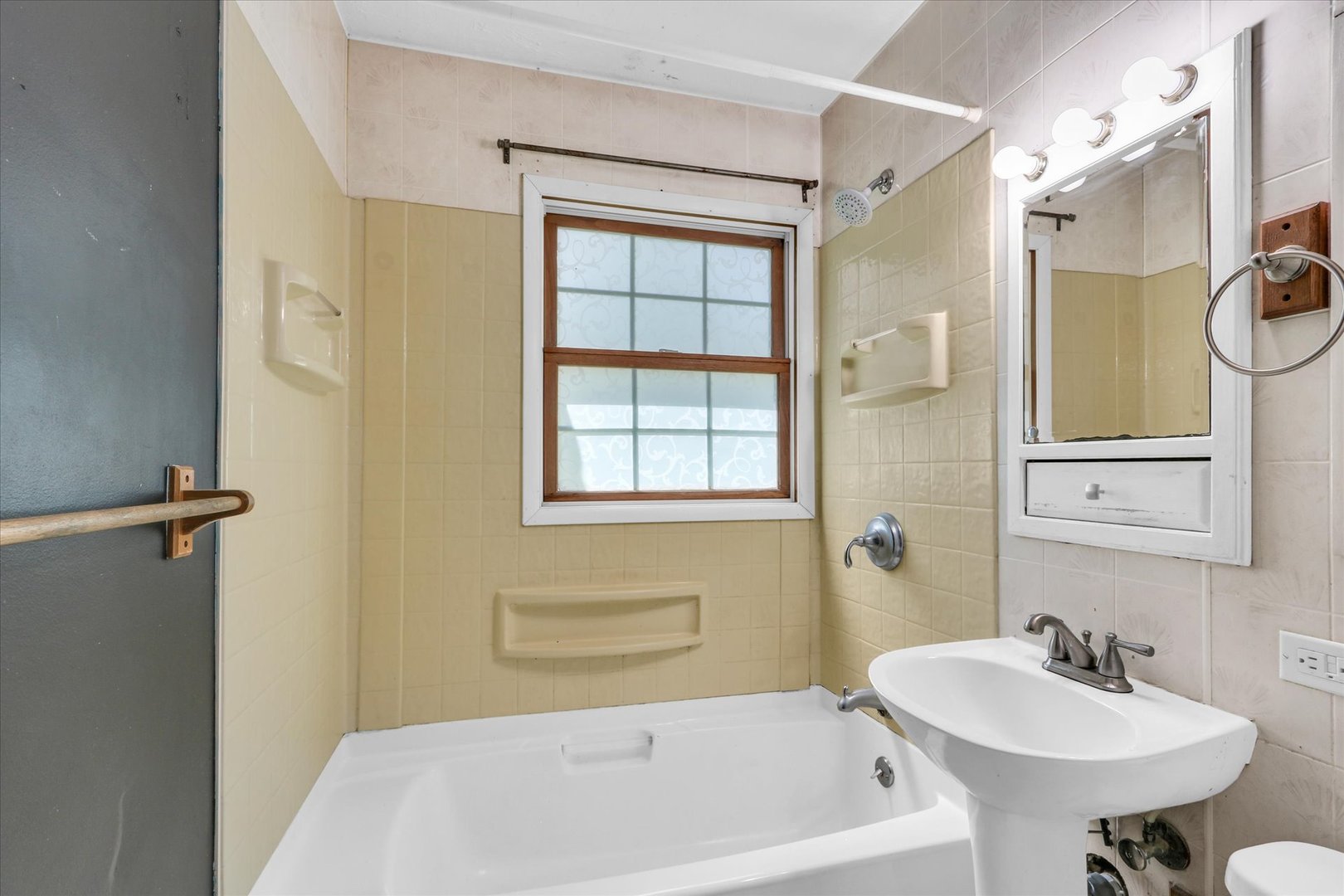 1108 Eastern Drive Urbana, IL 61801 - Photo 19 of 29 a bathroom with a sink a window and a mirror