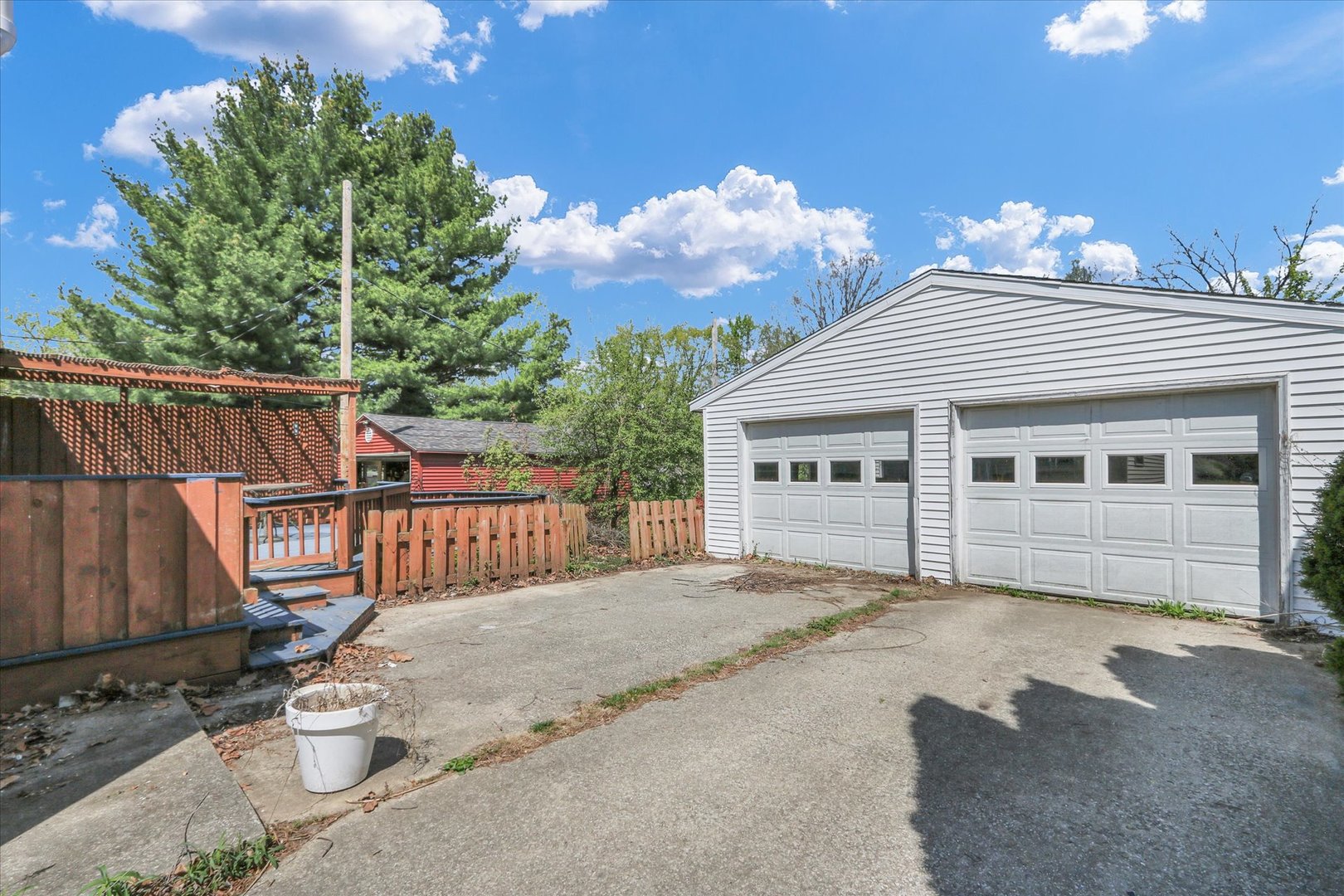 1108 Eastern Drive Urbana, IL 61801 - Photo 25 of 29 a view of a house with a small yard and wooden fence