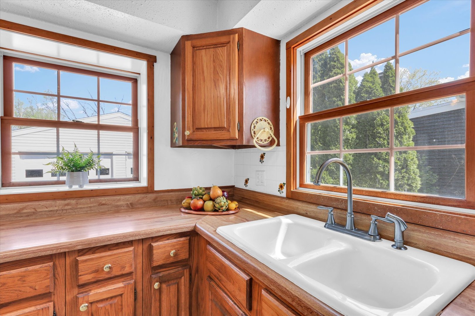 1108 Eastern Drive Urbana, IL 61801 - Photo 10 of 29 a kitchen with a sink and a window