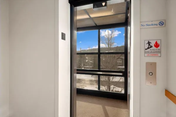 a view of a blue door and a window