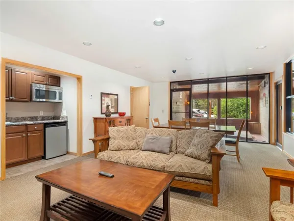 a living room with furniture and a window