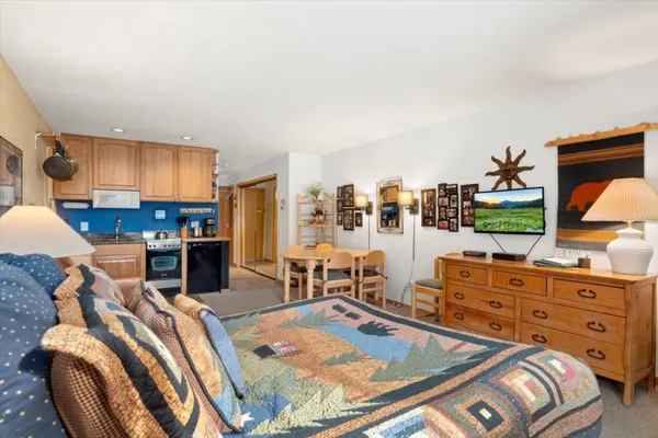 a bed room with a bed and furniture