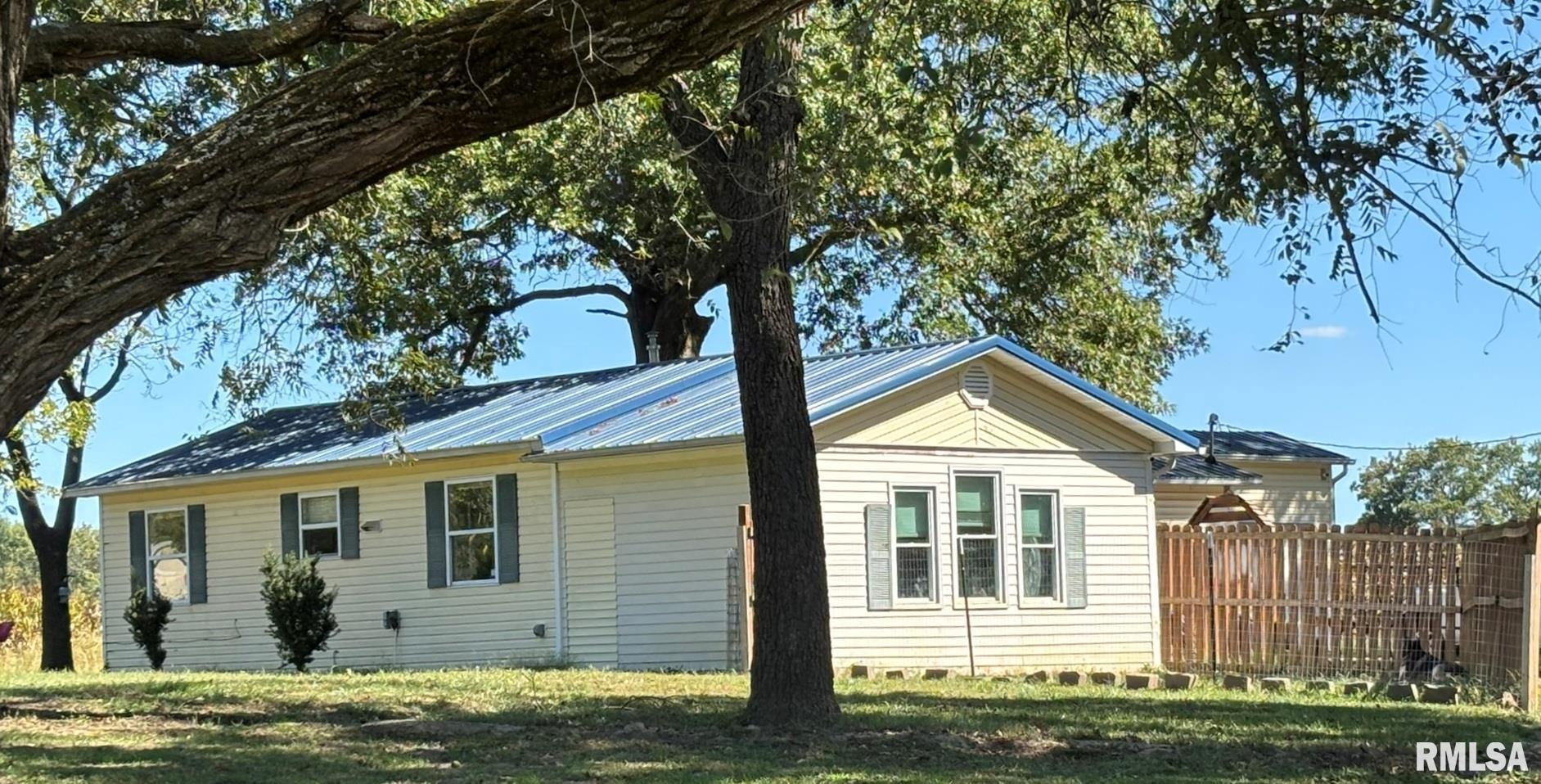 3152 Hotze Road Salem, IL 62881 - Photo 12 of 12 a front view of a house with garden