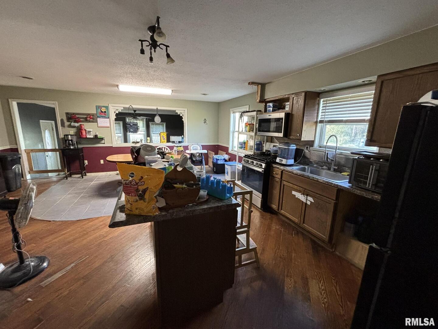 3152 Hotze Road Salem, IL 62881 - Photo 6 of 12 a living room with furniture large window and flat screen tv