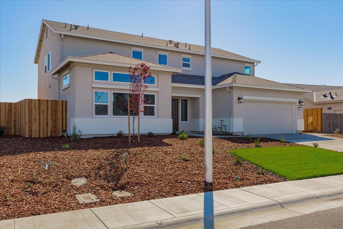 279 Piper Lane Colusa, CA 95932 - Photo 3 of 51 a front view of a house with garden