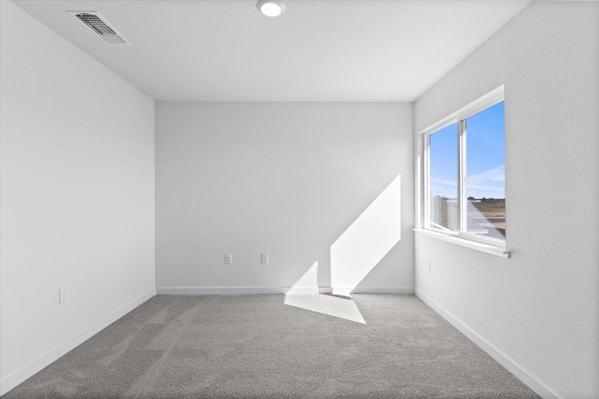 279 Piper Lane Colusa, CA 95932 - Photo 39 of 51 a view of an empty room with wooden floor and stairs