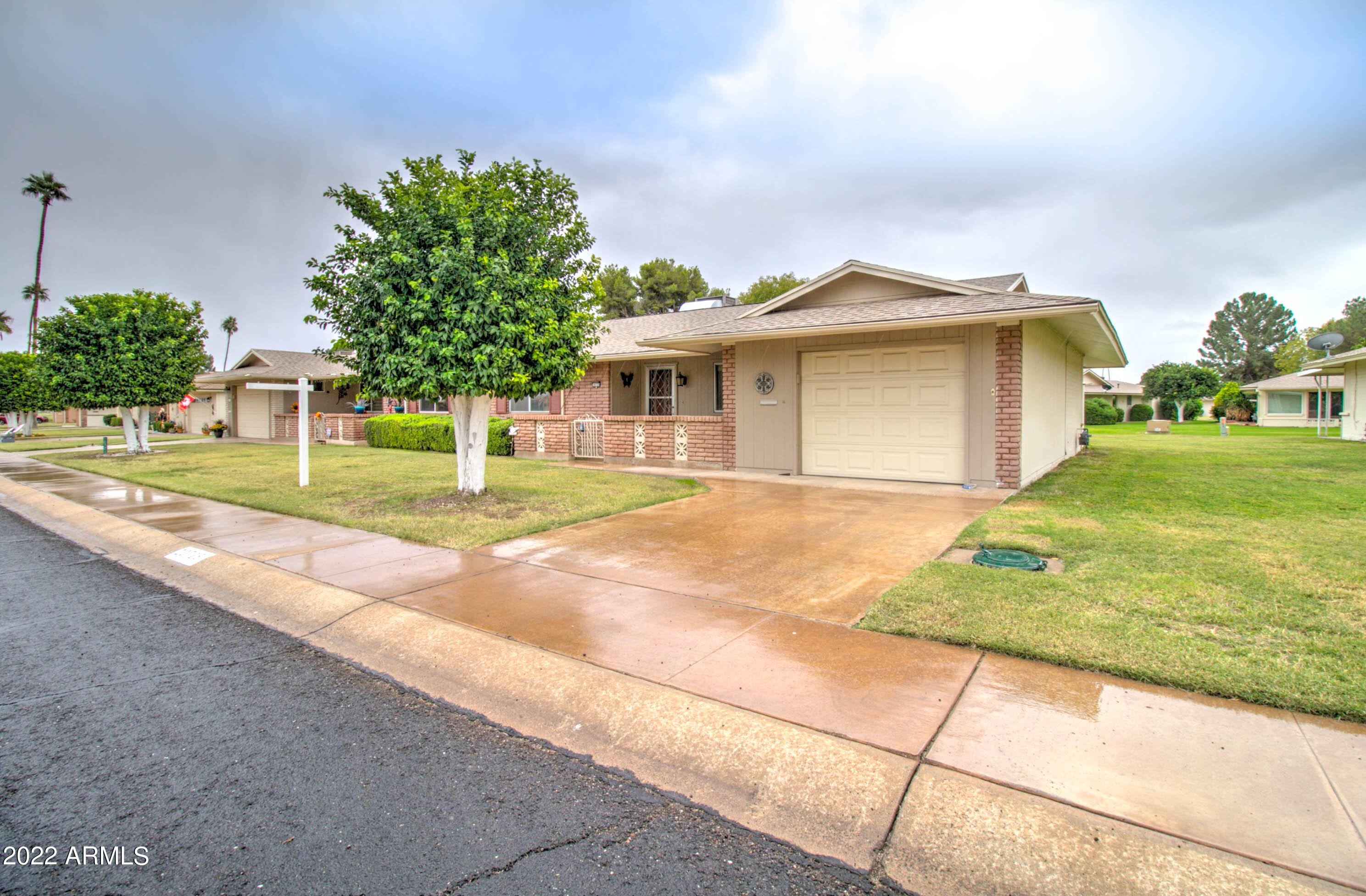 10725 West Hatcher Road Sun City, AZ 85351 - Photo 2 of 26 10725 W Hatcher Rd-2
