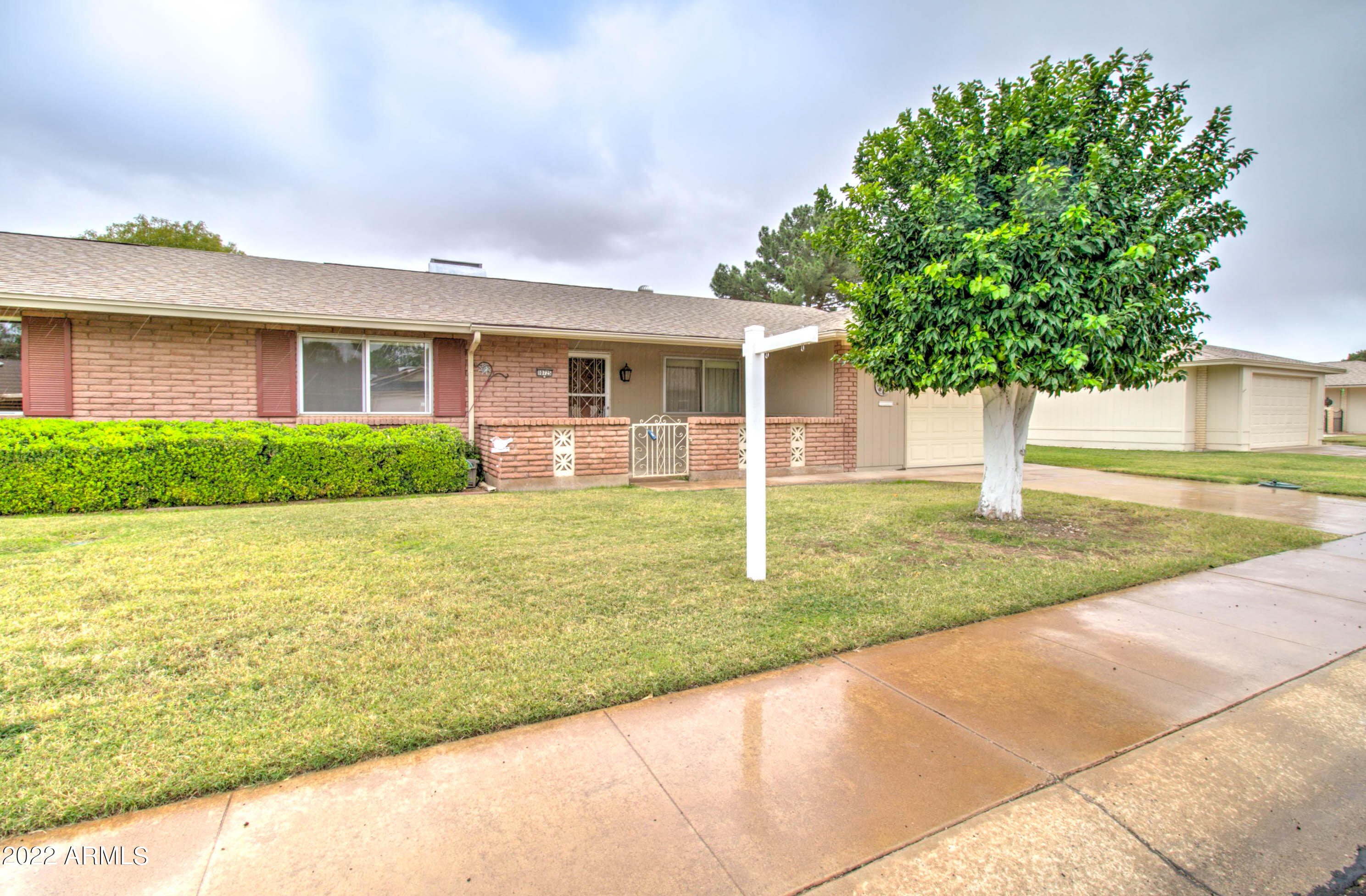 10725 West Hatcher Road Sun City, AZ 85351 - Photo 3 of 26 10725 W Hatcher Rd-3