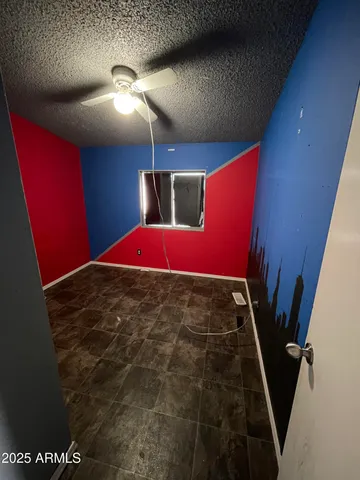 a bathroom with a sink a toilet and shower curtain