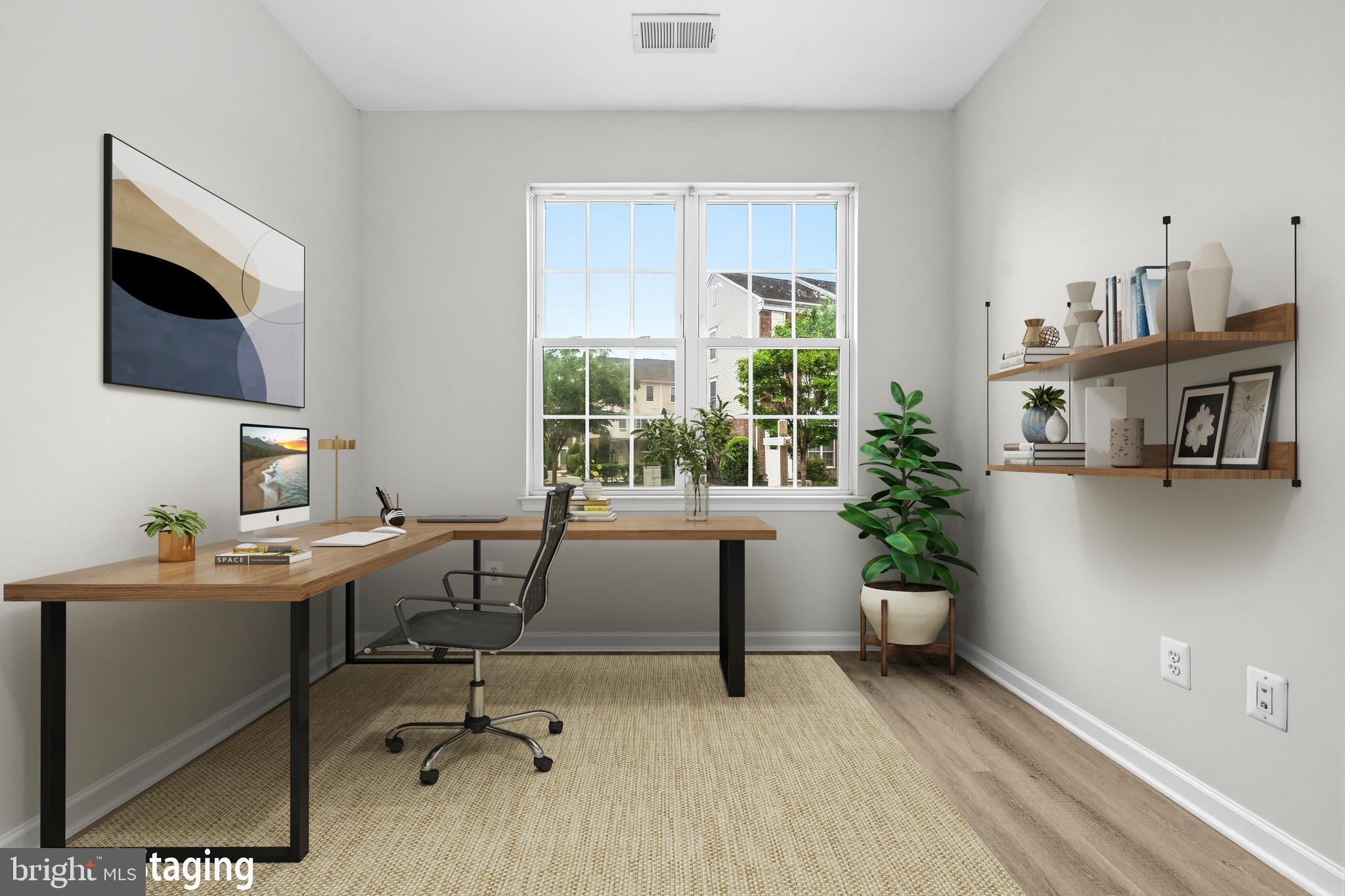 25154 Monteith Terrace Chantilly, VA 20152 - Photo 14 of 40 a view of a workspace with furniture and a window