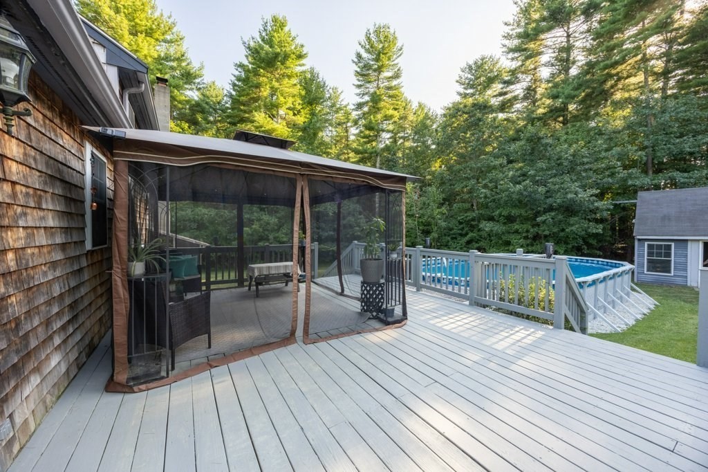9 Boxberry Lane Rochester, MA 02770 - Photo 14 of 35 a view of balcony with deck and wooden floor