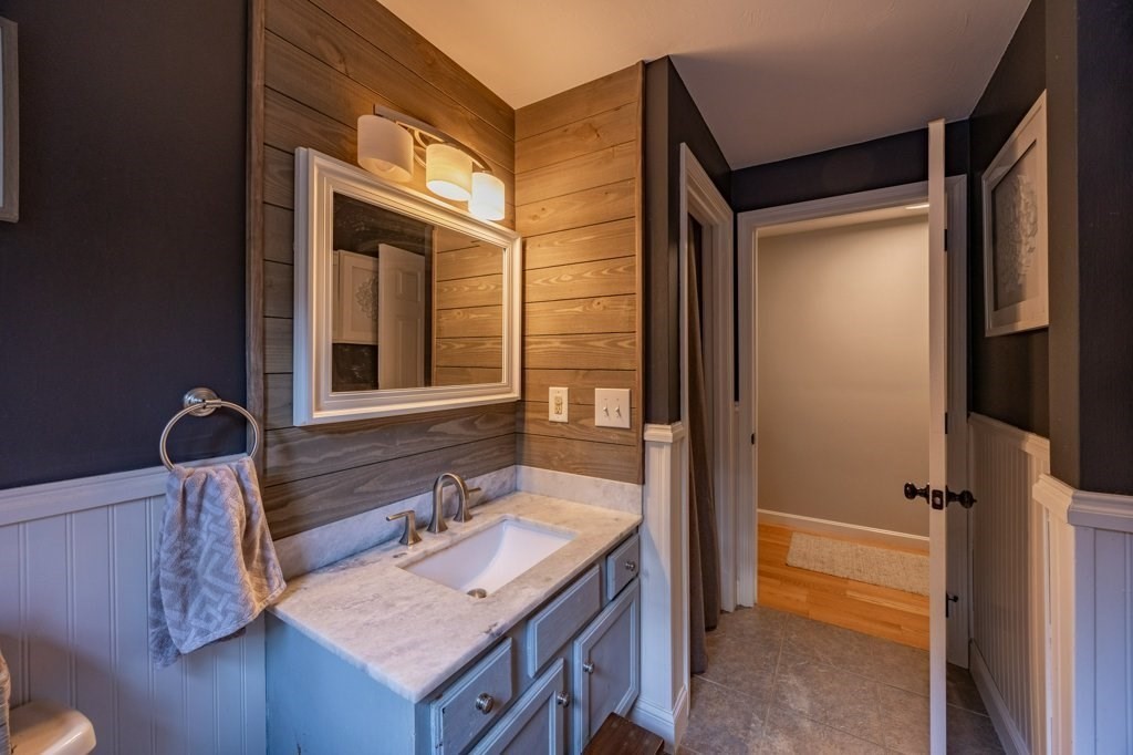 9 Boxberry Lane Rochester, MA 02770 - Photo 19 of 35 a bathroom with a sink and a mirror