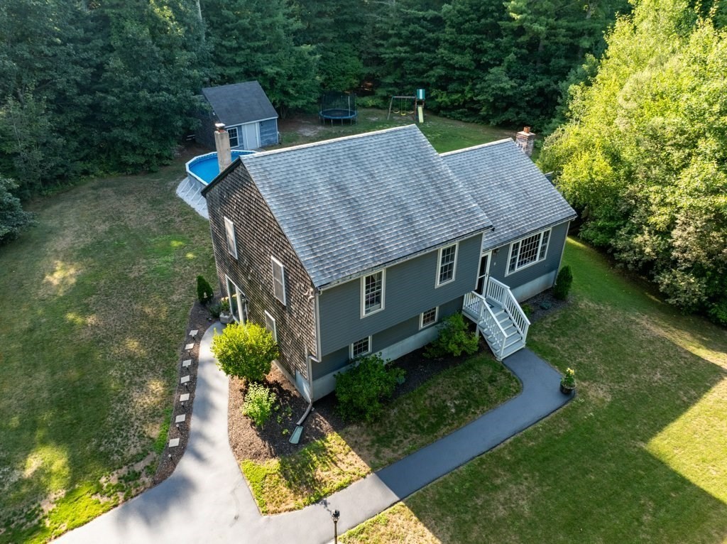 9 Boxberry Lane Rochester, MA 02770 - Photo 2 of 35 aerial view of a house with a yard