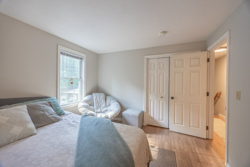 9 Boxberry Lane Rochester, MA 02770 - Photo 23 of 35 a bedroom with a bed and a window