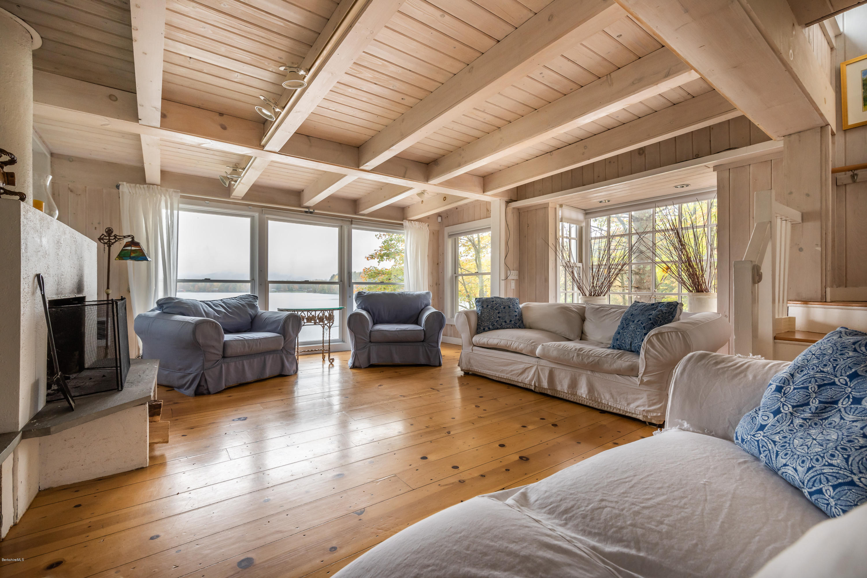 42 Lake Rd Extension Richmond, MA 01201 - Photo 14 of 40 a living room with furniture and a large window