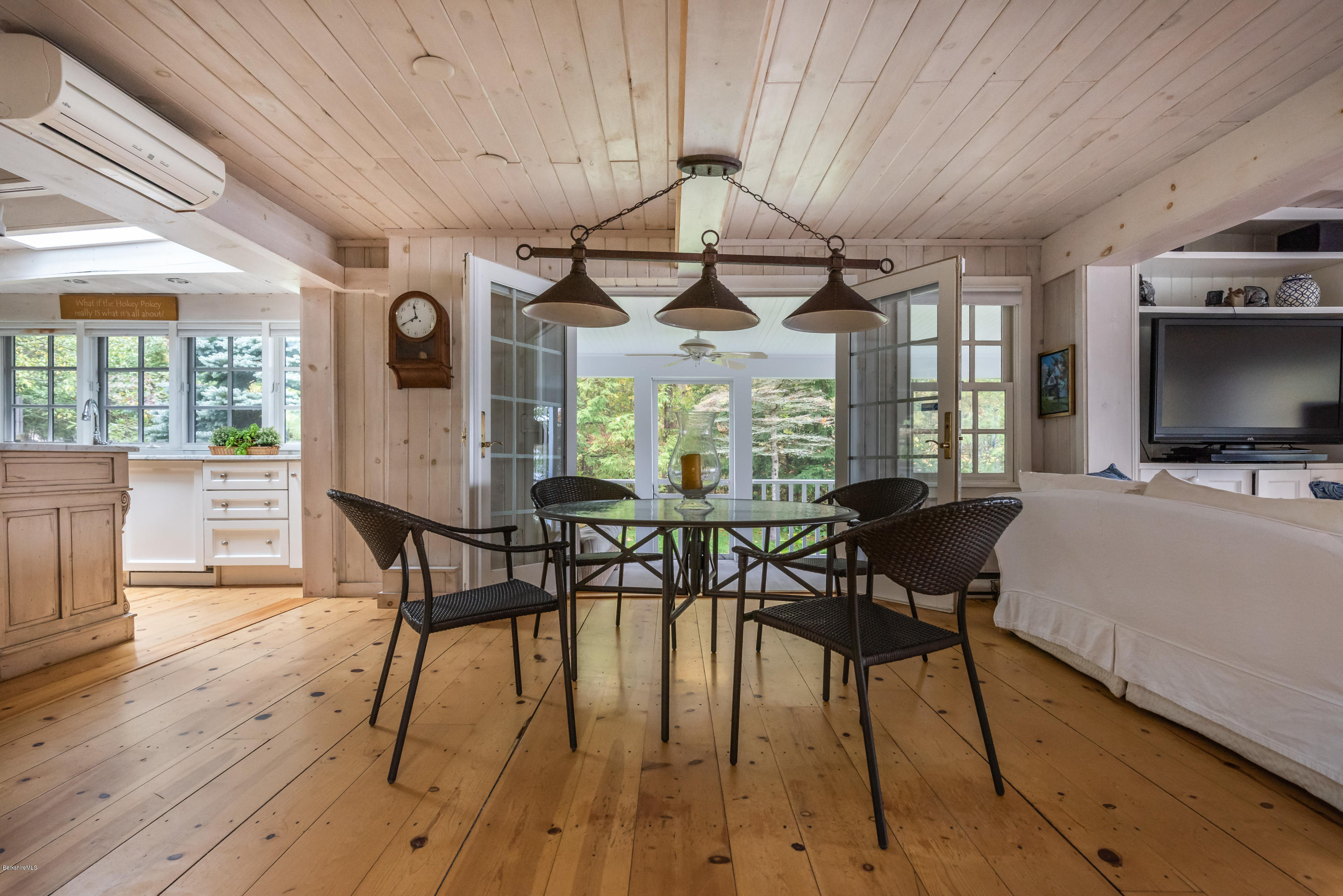 42 Lake Rd Extension Richmond, MA 01201 - Photo 17 of 40 a view of a dining room with furniture window and wooden floor