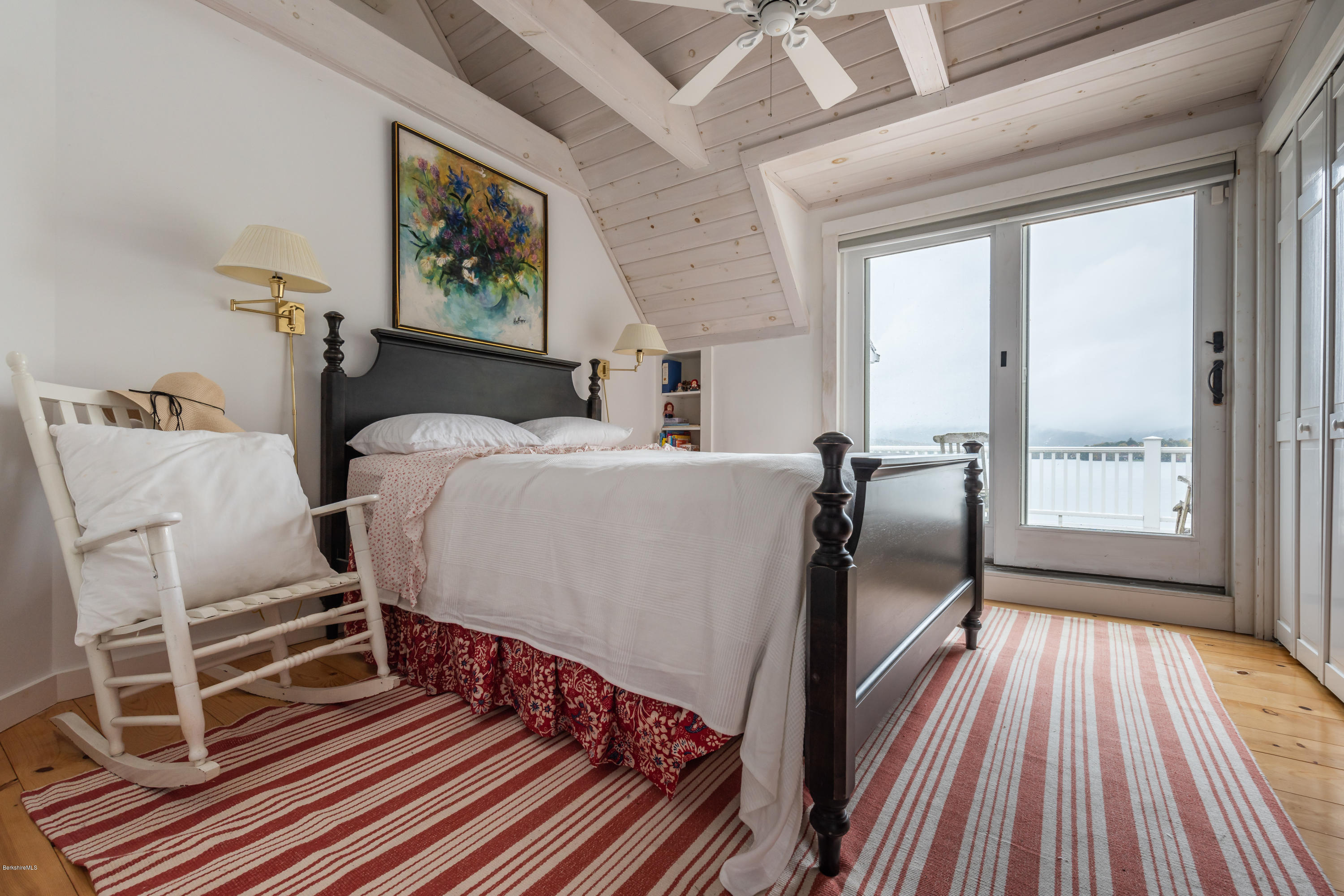 42 Lake Rd Extension Richmond, MA 01201 - Photo 28 of 40 a bed sitting in a bedroom next to a window