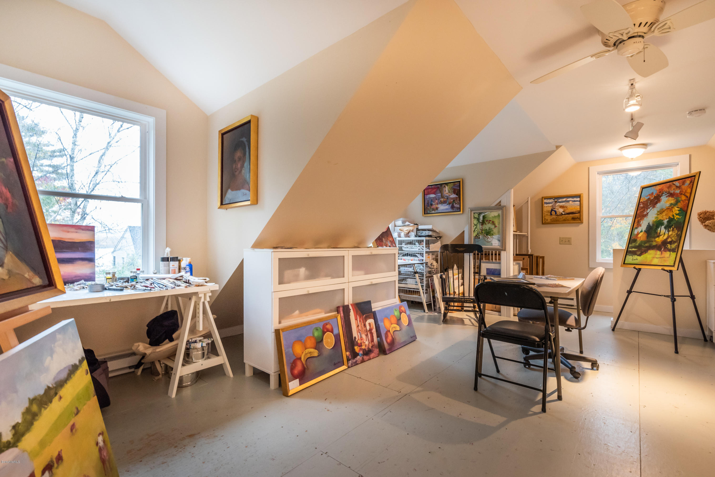 42 Lake Rd Extension Richmond, MA 01201 - Photo 38 of 40 a living room with furniture a fireplace and a large window
