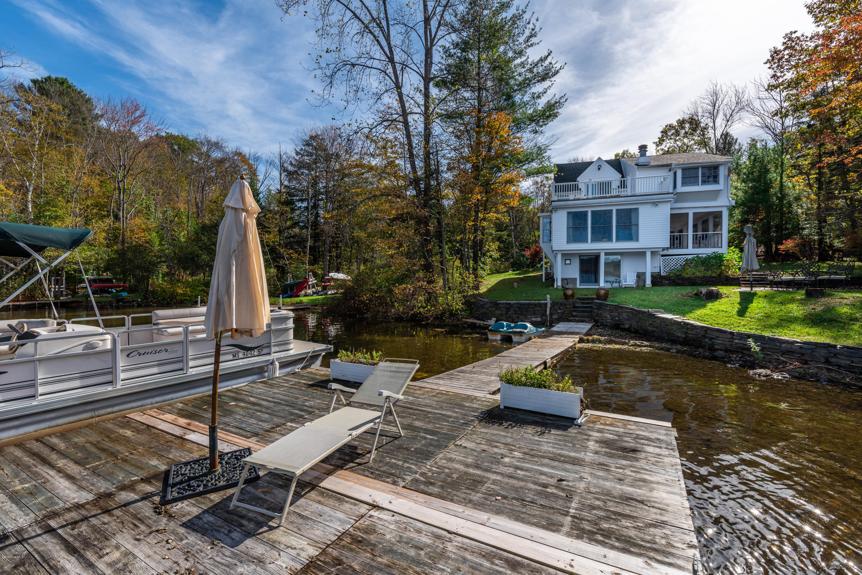 42 Lake Rd Extension Richmond, MA 01201 - Photo 6 of 40 a view of a lake with a house