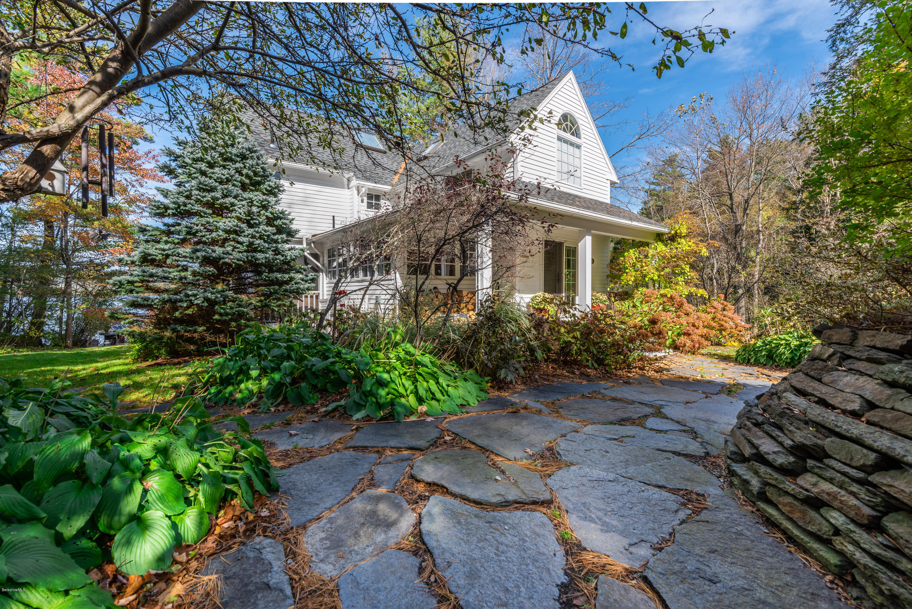 42 Lake Rd Extension Richmond, MA 01201 - Photo 8 of 40 a view of a house with a yard