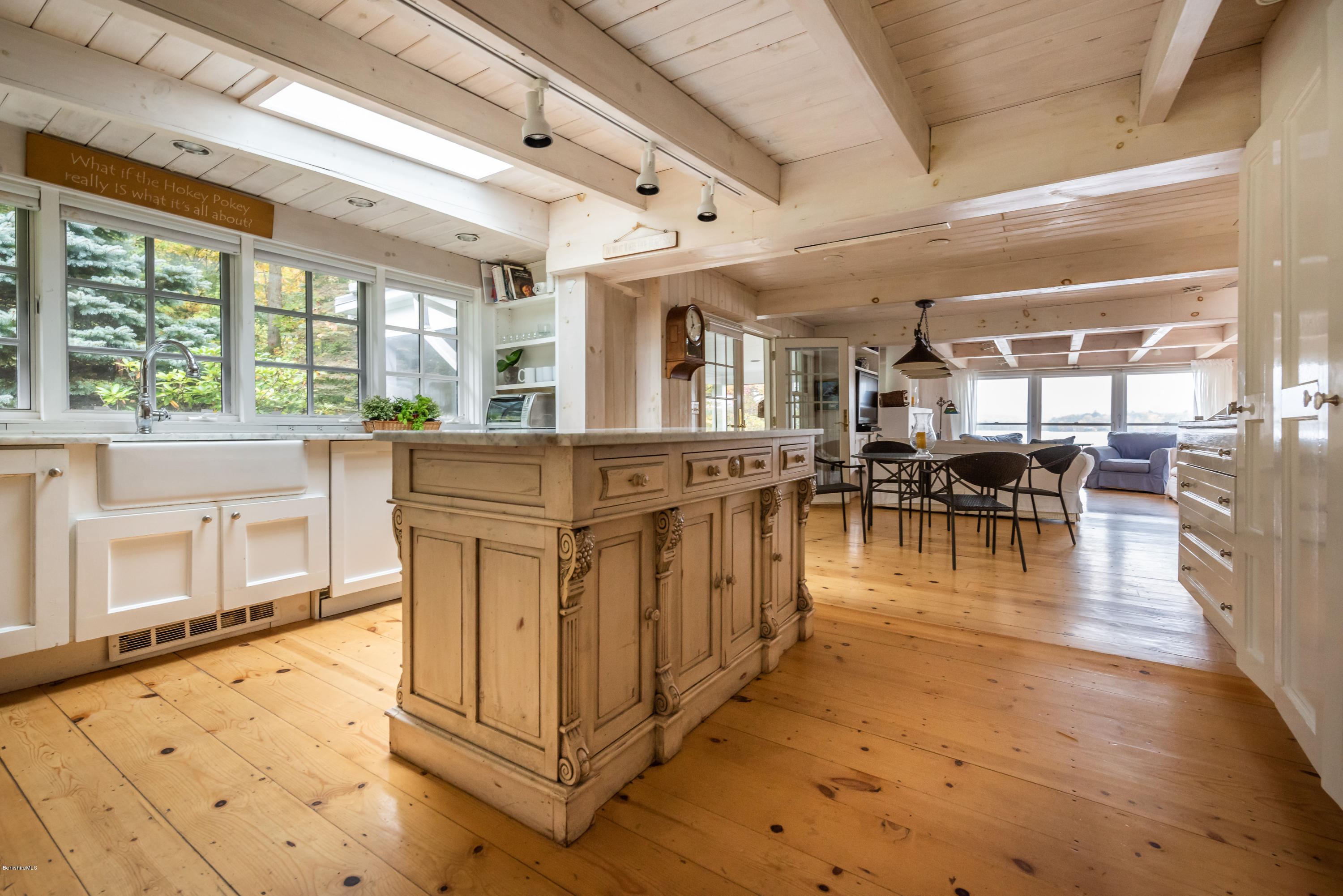 42 Lake Rd Extension Richmond, MA 01201 - Photo 10 of 40 a dining hall with stainless steel appliances granite countertop a stove and cabinets with wooden floor