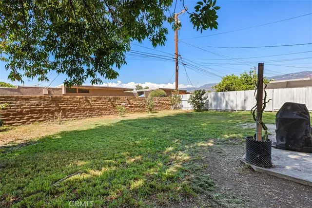 a view of a yard with an outdoor space