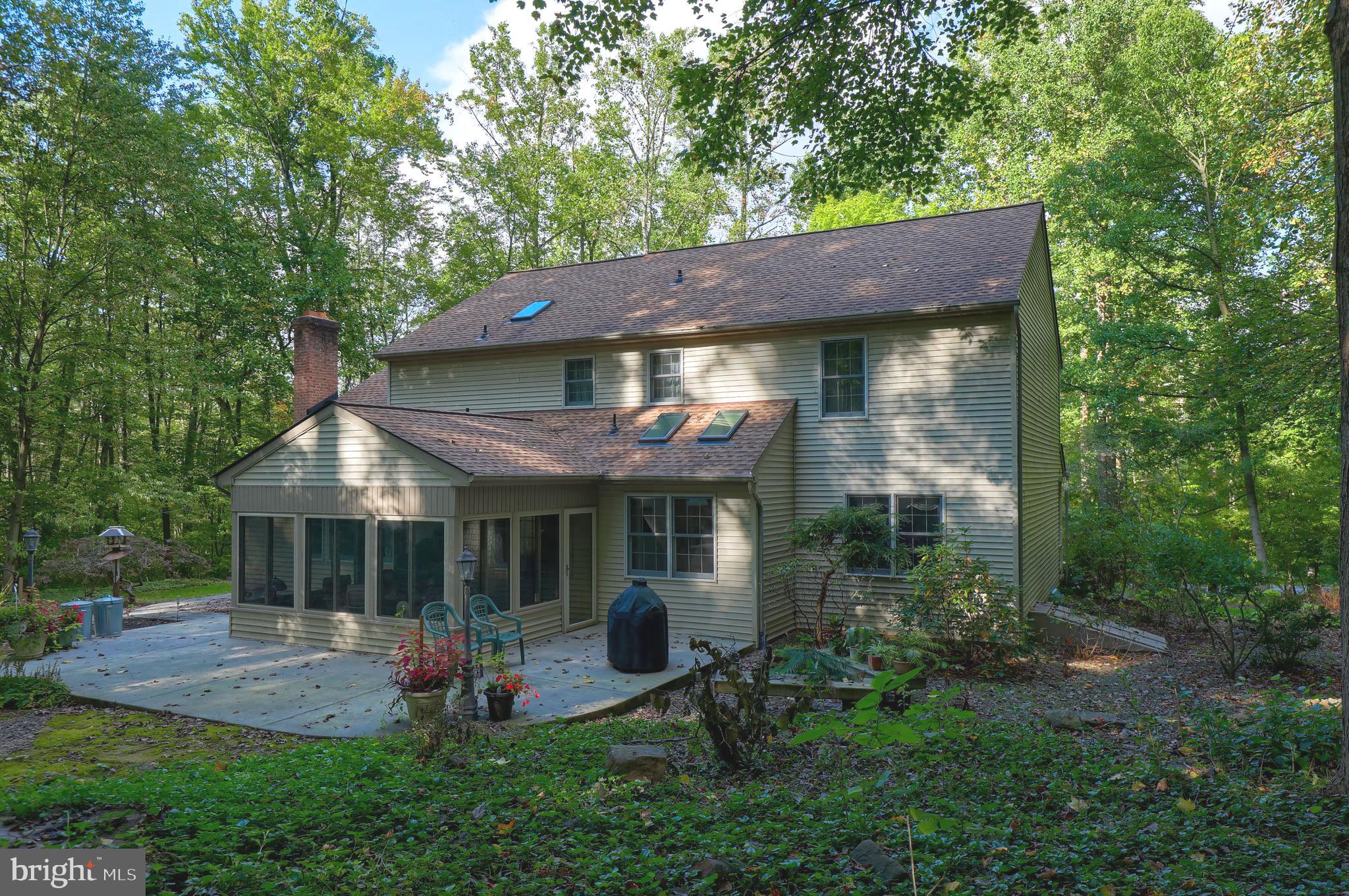 425 Greenville Road Denver, PA 17517 - Photo 7 of 51 Rear View of Home, Sun Room & Patio