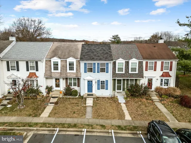 a view of a brick building with many windows
