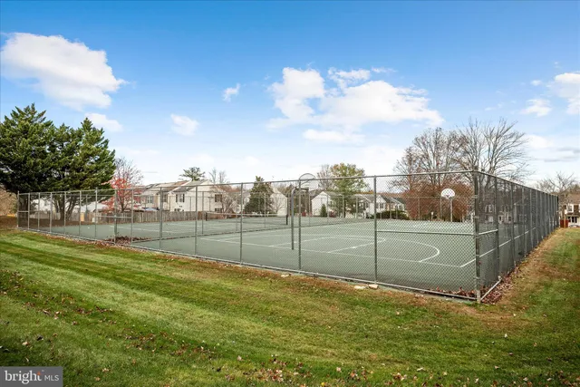 a view of a golf course with a lake view