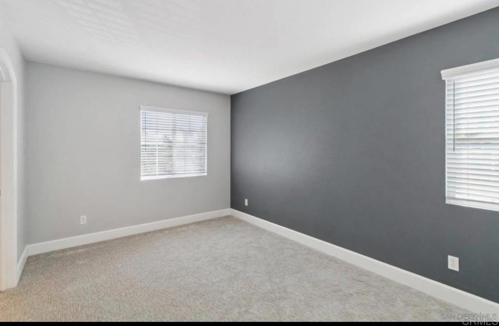 1234 Old Janal Ranch Road Chula Vista, CA 91915 - Photo 24 of 34 an empty room with windows
