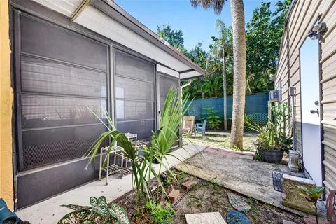a view of a house with backyard