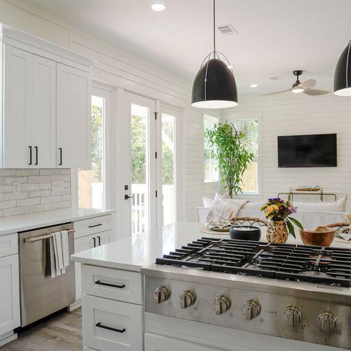 33 Maritime Way Santa Rosa Beach, FL 32459 - Photo 18 of 71 a kitchen with stainless steel appliances granite countertop a stove and a microwave