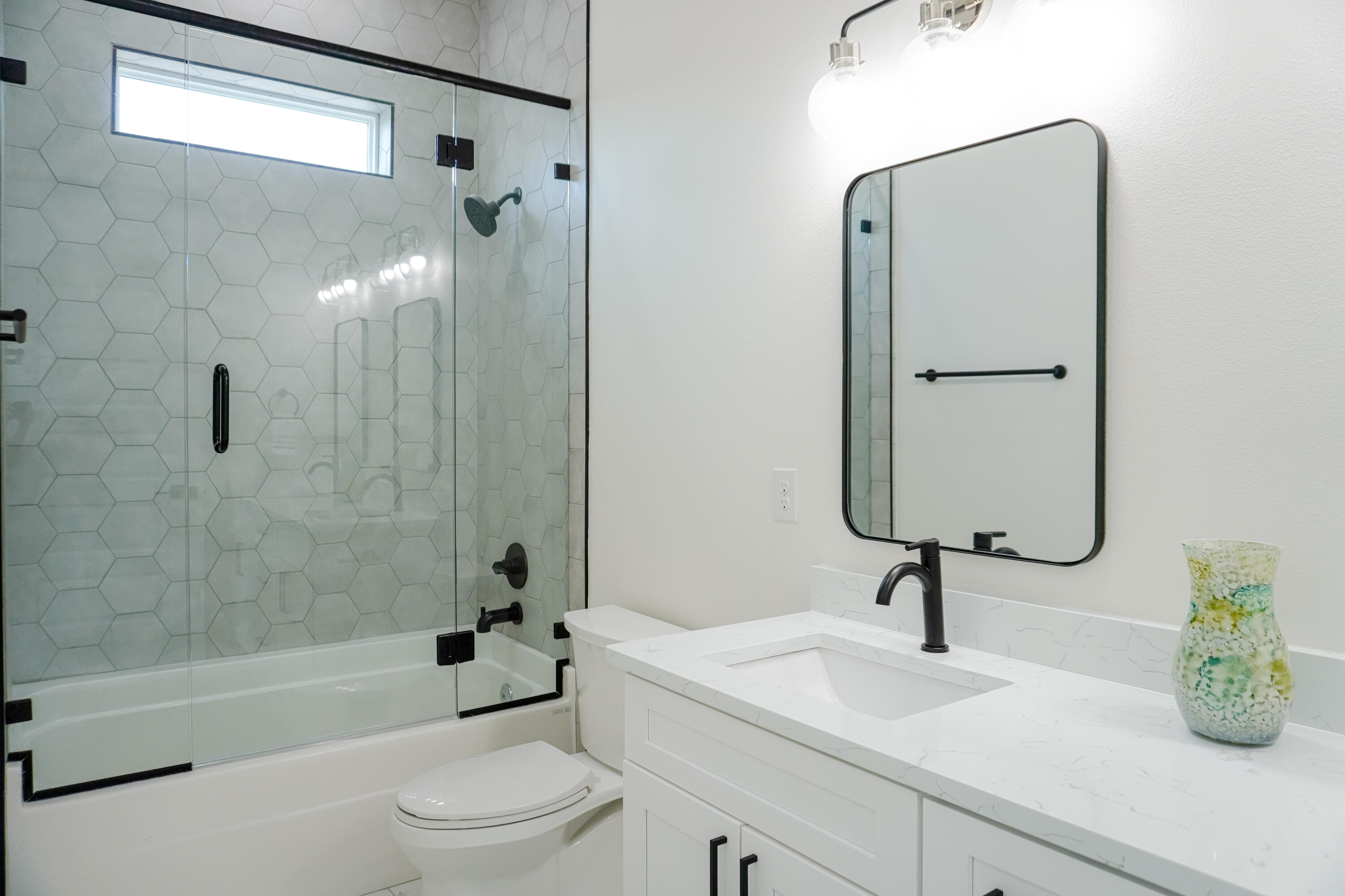 33 Maritime Way Santa Rosa Beach, FL 32459 - Photo 49 of 71 a bathroom with a sink a toilet and a mirror
