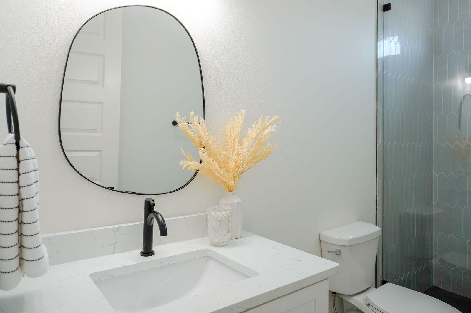 33 Maritime Way Santa Rosa Beach, FL 32459 - Photo 52 of 71 a bathroom with a sink a toilet and a mirror