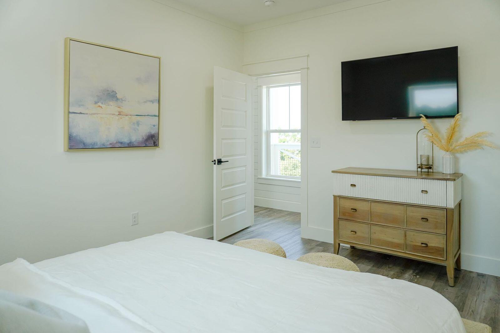 33 Maritime Way Santa Rosa Beach, FL 32459 - Photo 59 of 71 a bedroom with a bed and a flat screen tv