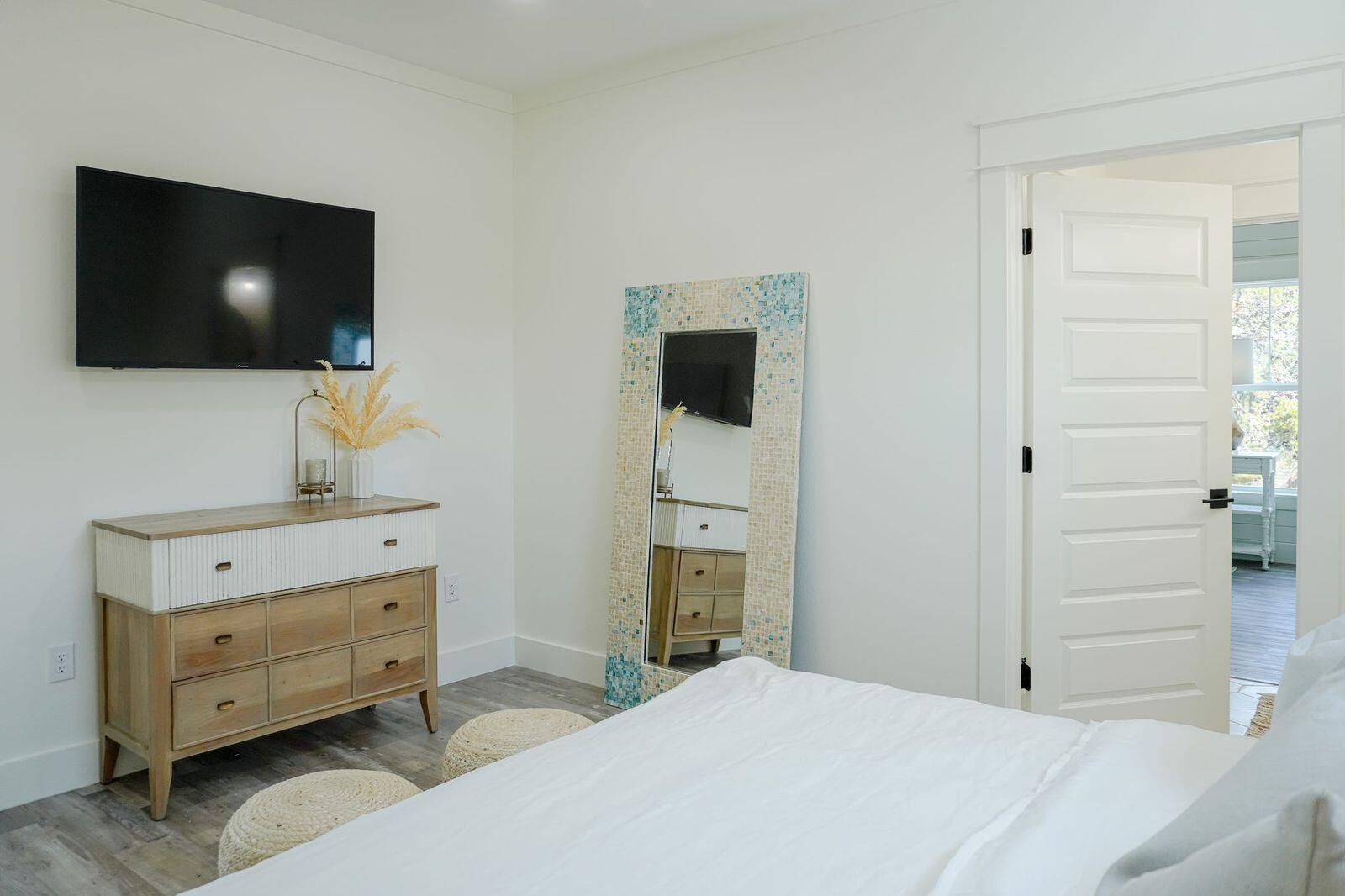 33 Maritime Way Santa Rosa Beach, FL 32459 - Photo 60 of 71 a bedroom with a bed and a flat screen tv