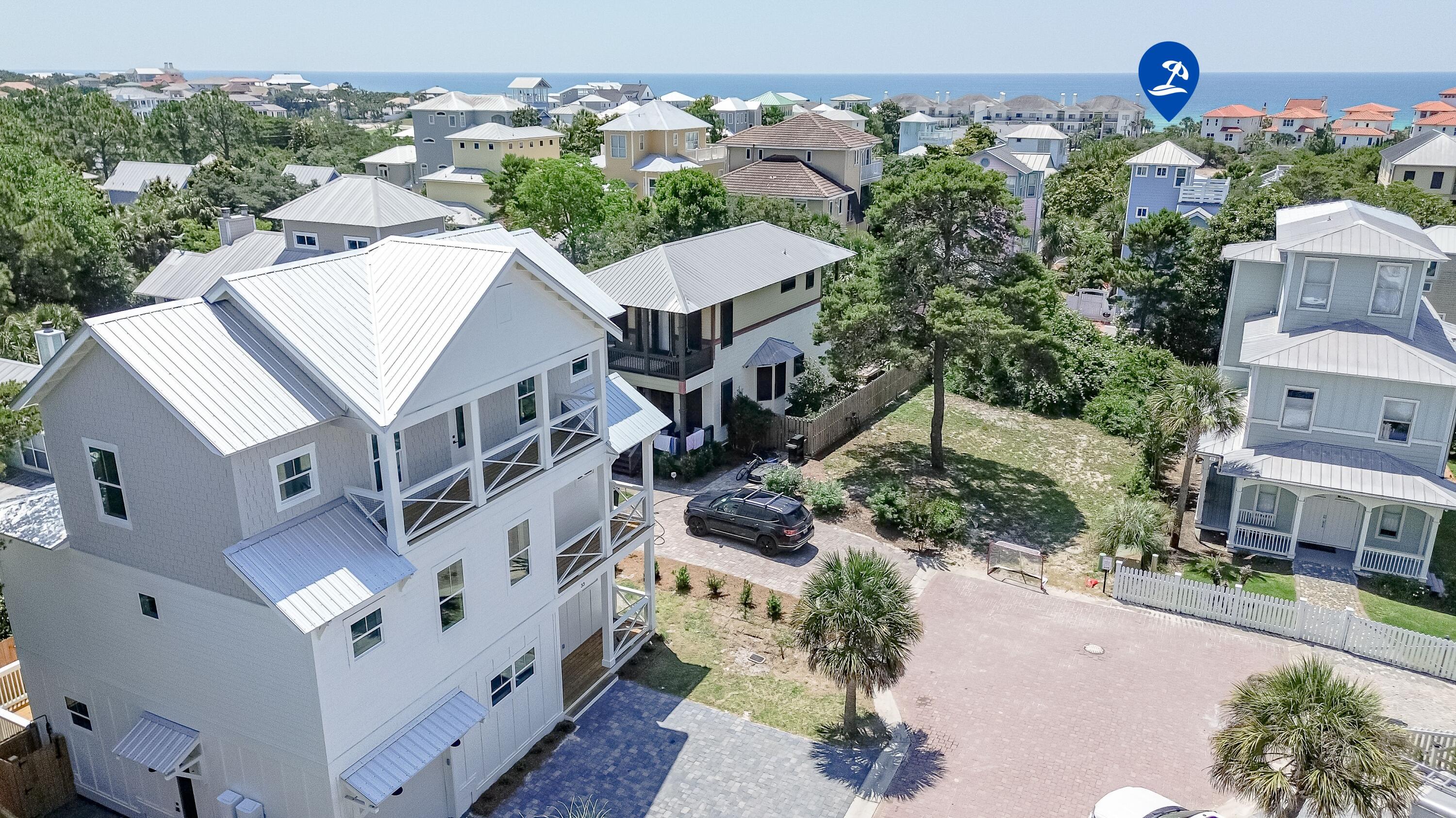 33 Maritime Way Santa Rosa Beach, FL 32459 - Photo 7 of 71 an aerial view of multiple houses with a yard