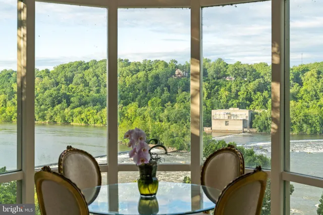 a view of a lake with a building in the background