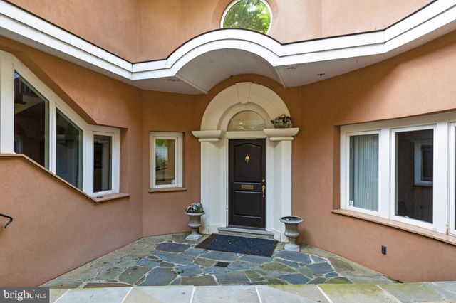 a view of a room with balcony and furniture